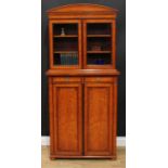 A Sheraton Revival rosewood crossbanded satinwood bookcase, of small and neat proportions, arched