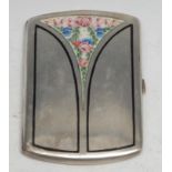 A German silver rounded rectangular cigarette case, spring-loaded hinged cover decorated in
