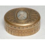 A Louis XVI Neoclassical gilt-metal oval snuff box, the hinged cover centred by a bust-length