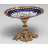 A 19th century French gilt-metal mounted Limoges enamel miniature cabinet comport, painted with