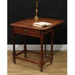 A George III oak gateleg side table, rounded rectangular top with fall leaf above a single frieze