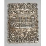 A Victorian silver shaped rectangular castle top visiting card case, in relief with a view of