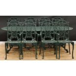 A contemporary cast alloy garden suite, the dining table in the manner of Coalbrookdale, 73cm high,