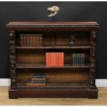 A late Victorian oak library open bookcase, rectangular top with leafy moulded edge above two