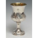 A Victorian silver campana wine goblet, chased with leafy swags, pendants and flowers, domed foot,