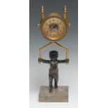 A late 19th century gilt and dark patinated bronze figural timepiece, 6cm circular clock dial with