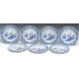 A set of seven 19th century Pearl Ware plates, transfer printed in blue with stylised flowers and