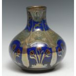 A Pilkingtons Royal Lancastrian bottle vase, designed by William S Mycock, with stylised tulips