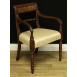 A George IV mahogany desk chair, reeded curved rectangular cresting rail, rope-twist mid rail,