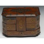 A 19th century rosewood sewing or jewellery cabinet, hinged canted rectangular cover enclosing