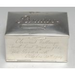 An Edwardian silver rectangular Bridge box, hinged cover and fall front enclosing privision for