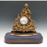 A 19th century French gilt metal mantel clock, 7.5cm enamel dial inscribed with Roman numerals, twin