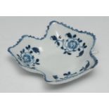 A Liverpool pickle leaf dish, painted with blue flowers, 9cm wide, c. 1765-7
