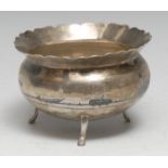 An Iraqi silver and niello circular bowl, decorated with a Middle Eastern desert landscape, shaped