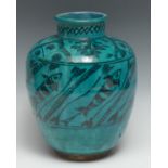 A Kashan ovoid vase, decorated in the Persian taste with stylised fish on a turquoise glaze, old