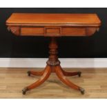 A Regency mahogany tea table, hinged rectangular top above a deep frieze centred by a raised