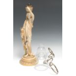 A Royal Worcester figural table lamp, made for Clarke's Cricklite Lamps, she stands wearing