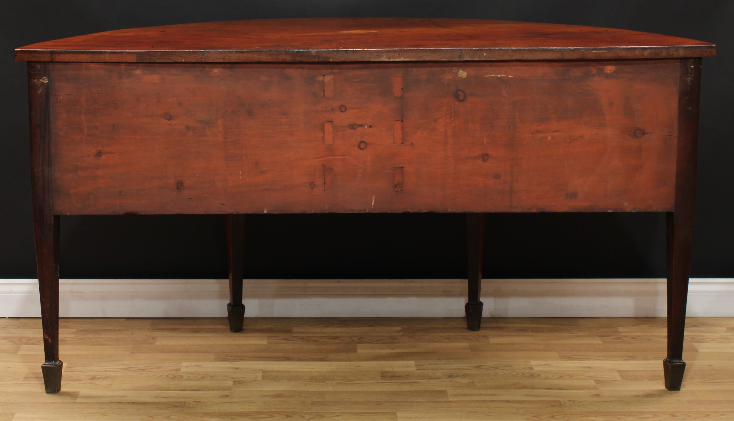 A George III mahogany demilune sideboard or serving table, slightly oversailing top centred by a - Image 6 of 6