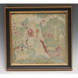 An early 18th century needlework picture, in canvas work with a shepherdess seated with a lion and