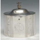 A George III Provincial silver oval tea caddy, hinged domed cover with pineapple finial, bright-
