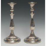 Matthew Boulton - a pair of George III silver table candlesticks, campana sconces with detachable