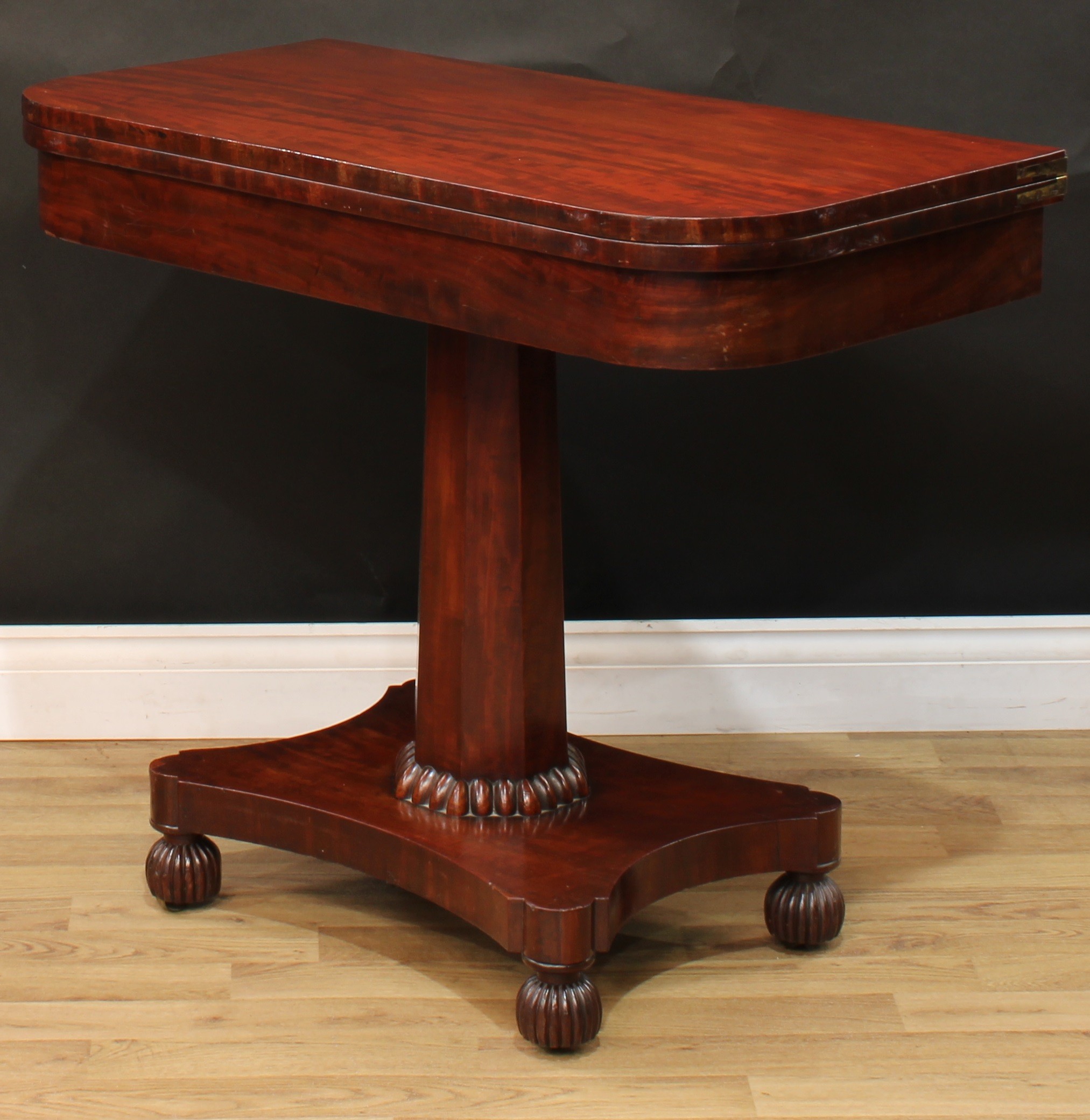 A William IV mahogany card table, hinged top, spreading octagonal column, egg socle, hipped - Image 4 of 5
