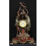 An Art Nouveau period, bronze patinated spelter and Rosso Antico marble figural mantel clock, 9.