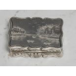 An early Victorian silver shaped rectangular castle top vinaigrette, hinged cover engraved with a