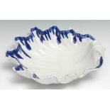 An 18th century large pearlware shell shaped dish, dripped blue border, 28cm wide, c.1790