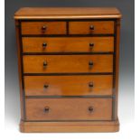 Miniature Furniture - a Victorian oak chest, rounded rectangular top above two short and four long