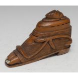 A 19th century novelty snuff box, carved as a foot, the toenails inlaid with abalone, bearded mask