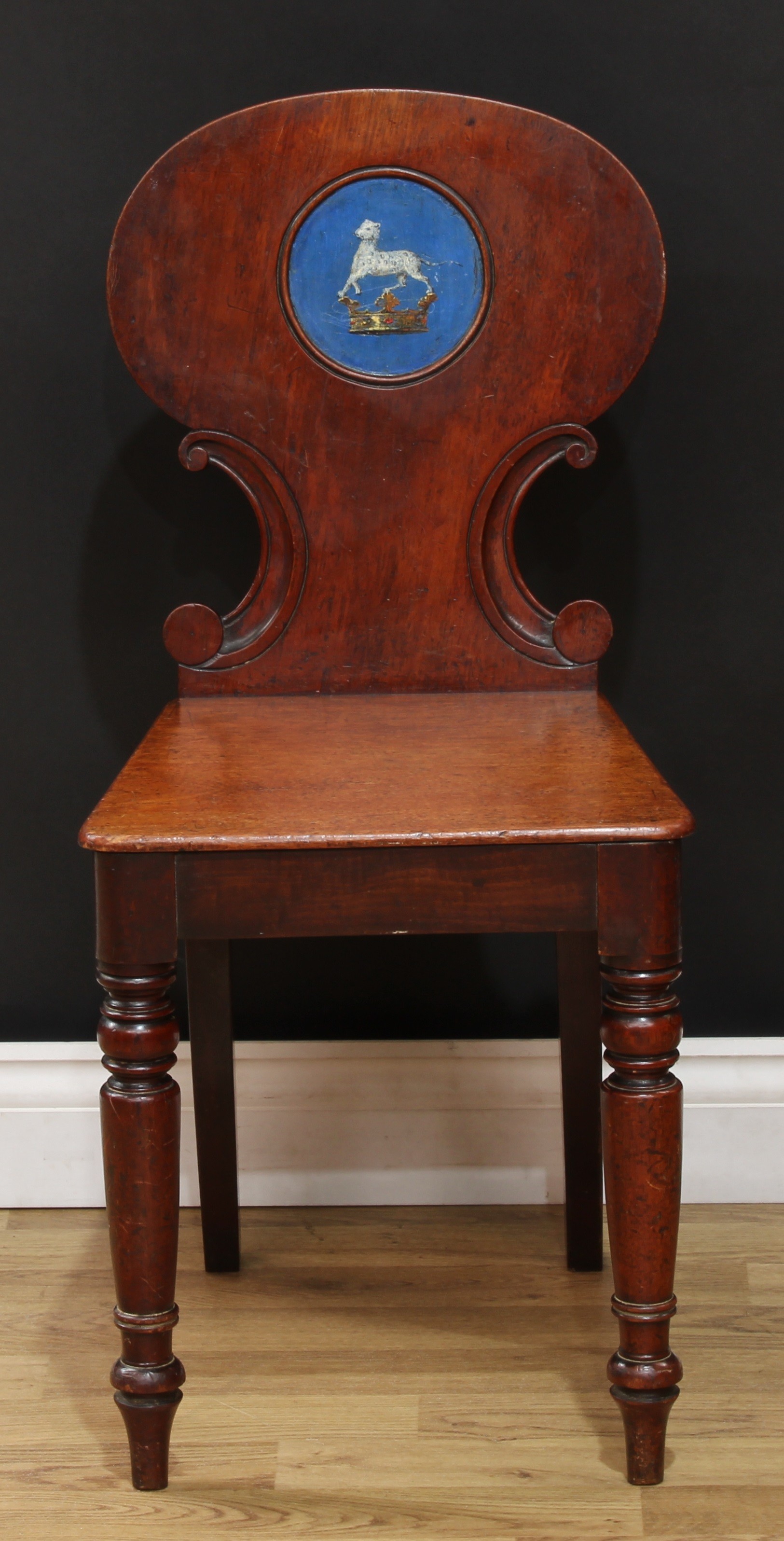 A Victorian mahogany heraldic hall chair, shaped back carved with C-scrolls and polychrome painted - Image 2 of 5