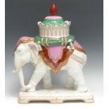 A Taylor, Tunnicliffe & Co earthenware table centre, as an Indian elephant, its howdah surmounted by