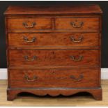 A George III mahogany chest, rosewood crossbanded rectangular top above two short and three long