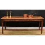 A French Provincial fruitwood serving or dining table, rectangular plank top, tapered square legs,