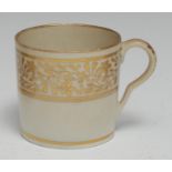 A Pinxton coffee can, pattern No. 283, decorated in gilt with scrolling foliate band, marked 283,