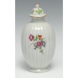 A Worcester fluted tea canister and cover, painted with scattered English flowers, 14cm high, c.1775