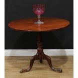 A 19th century mahogany tripod occasional table, circular tilting top, partially wrythen canon-