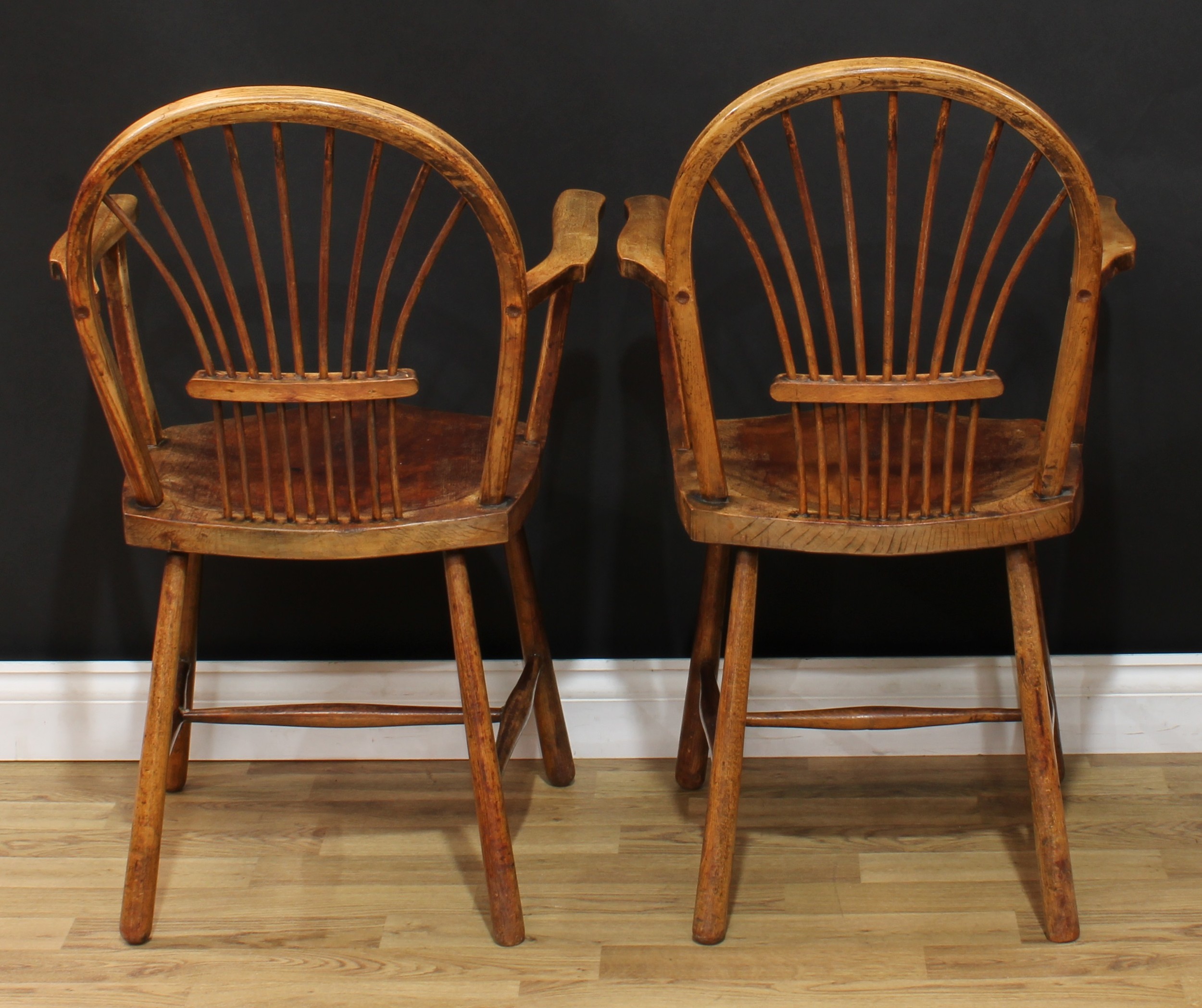 A pair of 19th century sheaf-back elbow chairs, of Windsor chair construction, hoop backs, saddle - Image 4 of 4
