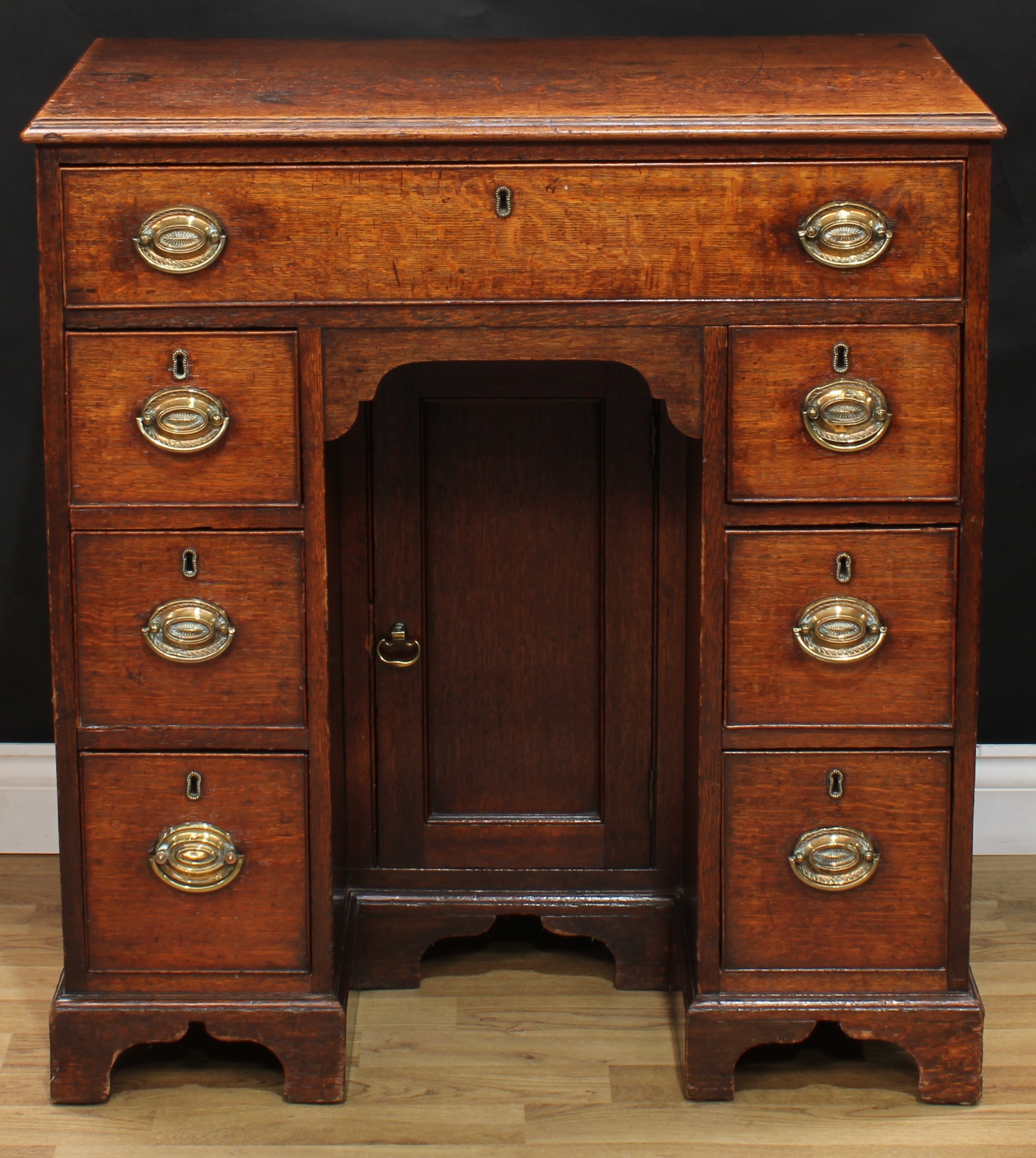 A George III oak kneehole desk, rectangular top with moulded edge above a long cockbeaded frieze - Image 2 of 6