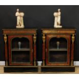 A pair of 19th century gilt metal mounted Boulle and ebonised pier cabinets, each rectangular top