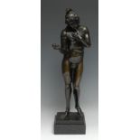 A dark patinated bronze, of Adam, he stands nude but for a Phrygian cap and a fig leaf, the