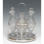 Matthew Boulton - a George III silver oval four bottle dessert cruet, the reeded frame restraining