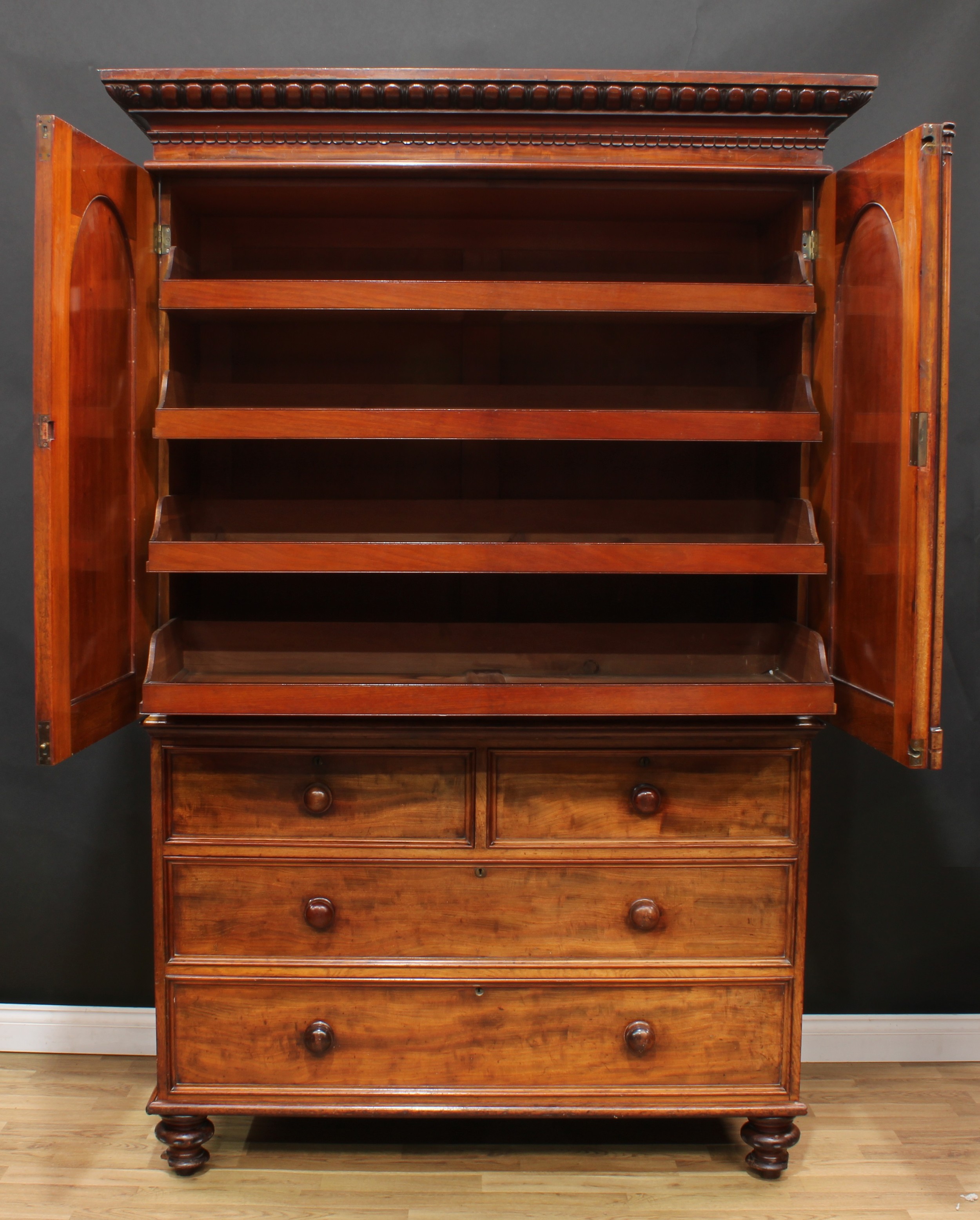 A William IV mahogany linen press, outswept egg-and-dart cornice above a pair of arched panel - Image 2 of 3