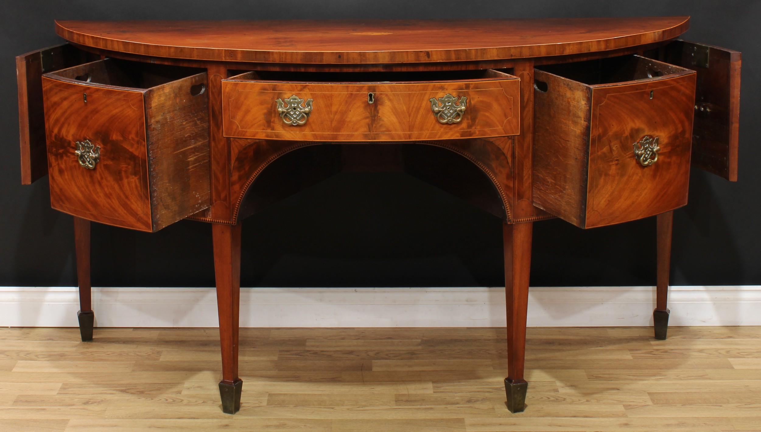 A George III mahogany demilune sideboard or serving table, slightly oversailing top centred by a - Image 3 of 6