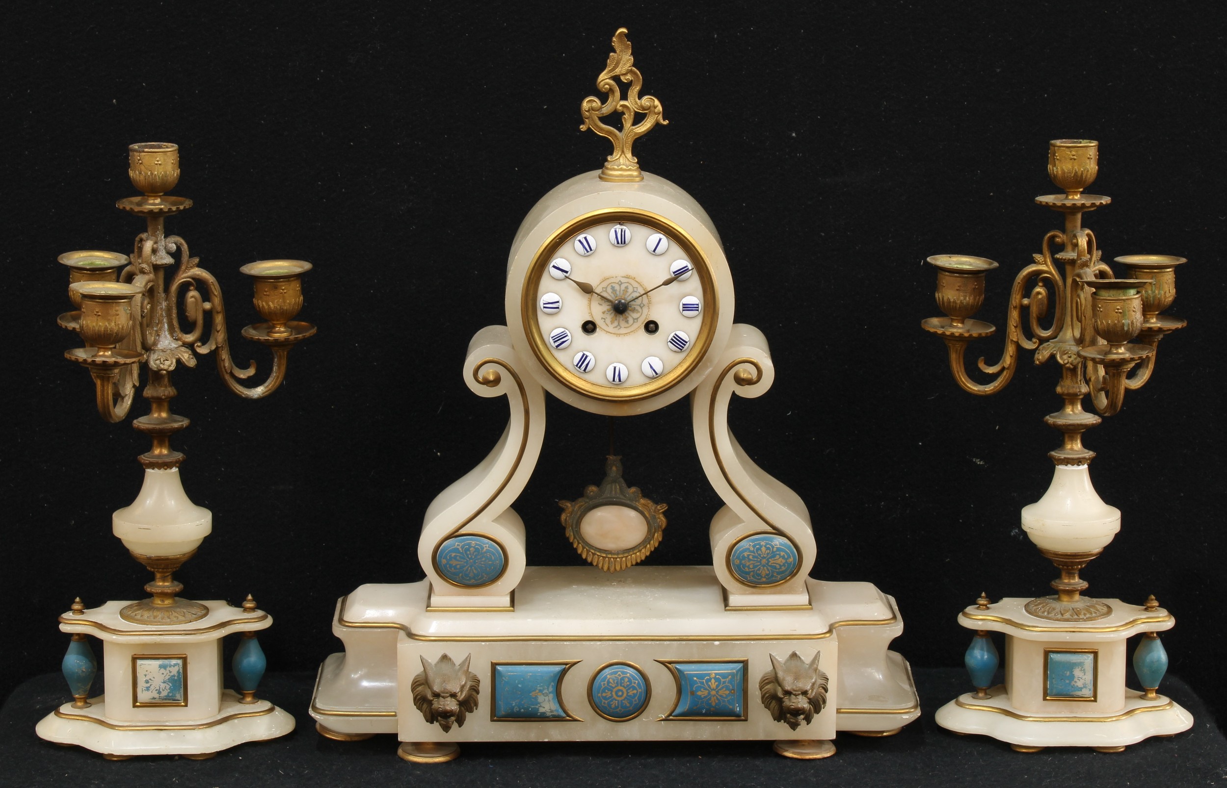 A 19th century French Grecian Revival alabaster clock garniture, 9.5cm circular dial inscribed