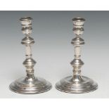 A pair of George I style silver candlesticks, knopped pillars, circular bases, 17cm high, marks