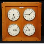 A mid-20th century electric four dial bank or factory clock, by Gents of Leicester, each 14.5cm