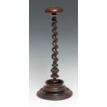 Treen - a post-Regency lignum vitae wig stand, domed cresting above a rope-twist collar, spirally