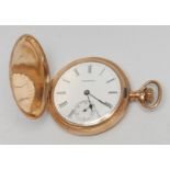 A late 19th century 9ct rose gold plated Waltham full hunter pocket watch, white enamel dial,